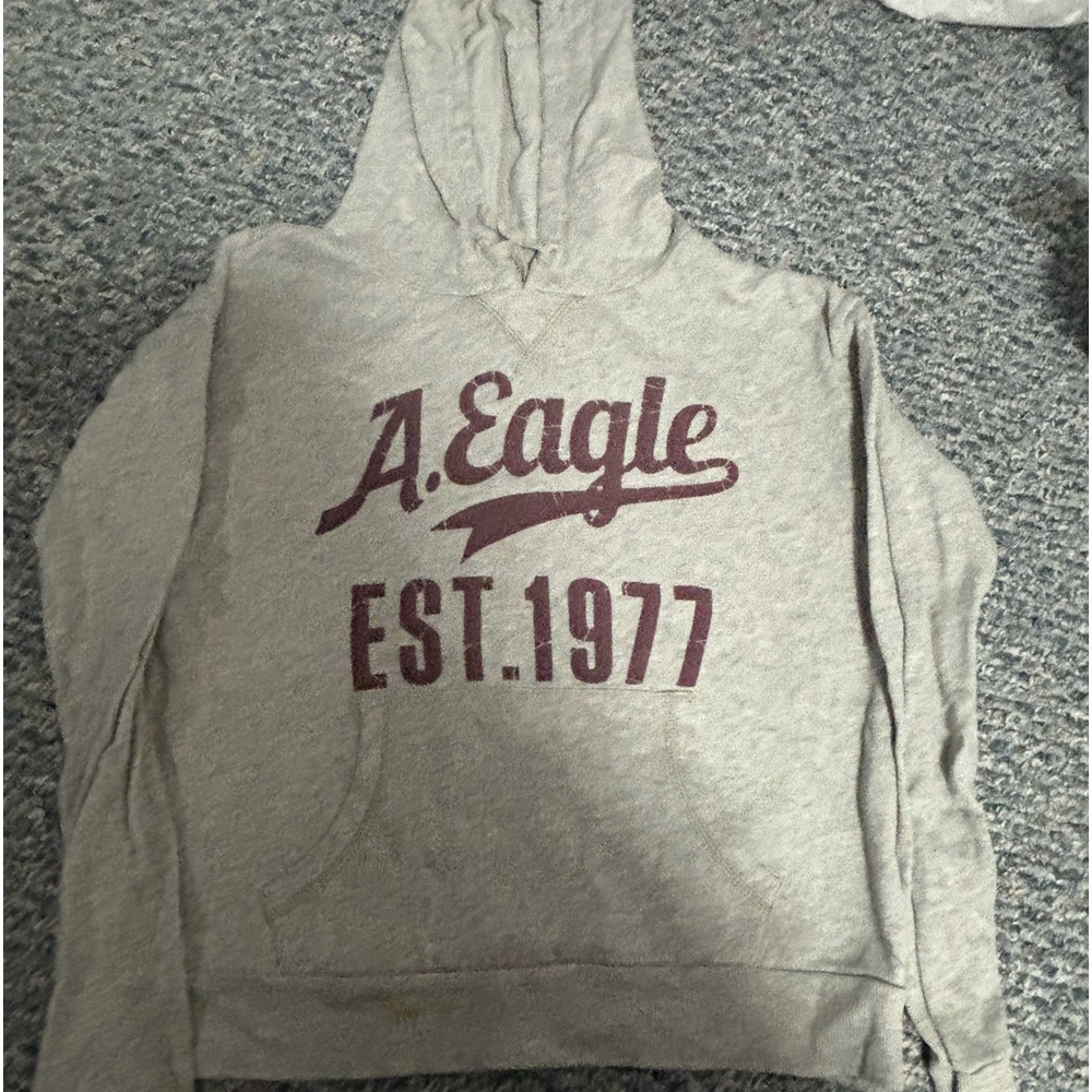 American Eagle women’s gray hoodie, burgundy silk screened 
No stains or flaws